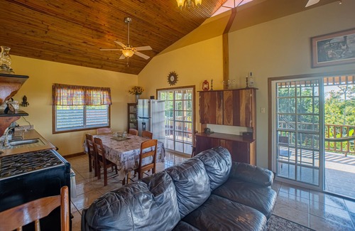 San Antonio Cabin | Charming cabin with private balcony, lush views & eco-friendly features