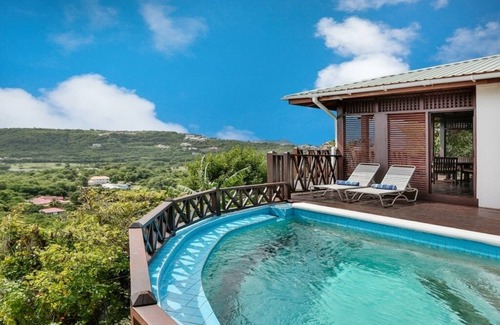 Cap Estate Cottage | Charming Cottage Located In Cap Estate - Orchid Cottage 1 Bedroom Home by RedAwning