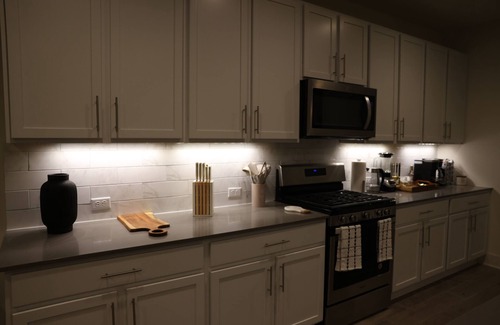 McNeil Apartment | Charming Getaway: Stylish Room in Prime Location with Great Amenities!