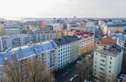 Alppiharju Apartment | Charming suite with garden views steps from metro