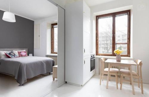Alppiharju Apartment | Charming suite with garden views steps from metro