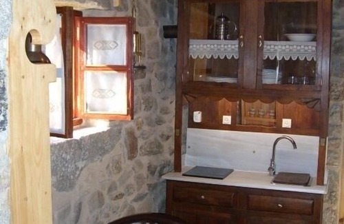 Poio Cottage | Charming traditional stone cottage nestled in the woods minutes from coast