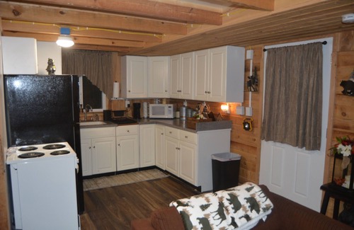 Carlton Cabin | CHASIN' MEMORIES,nCozy, rustic cabin. Close to many boating and fishing lakes.n