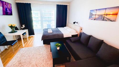 Oulu Apartment | City center 1R studio with perfect view, parking