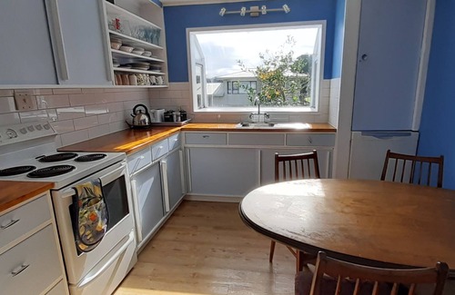 Mokau House | Classic Kiwi Bach Mokau with Seaviews