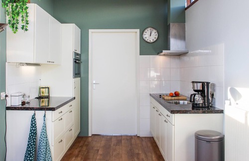 Bunschoten House | Close to the marina and with a view of polder landscape and the bird breeding area, this beautiful v