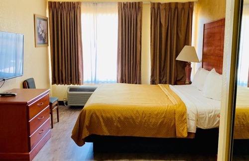 Magnolia Hotel | Coachman's Inn