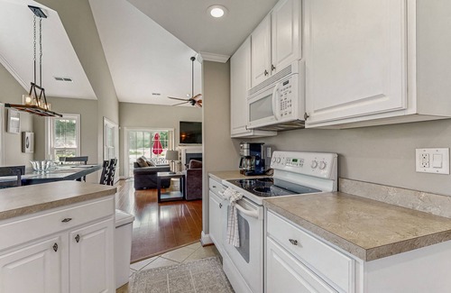 Ocean Pines House | Coastal resort with pool, golf, fireplace, W/D, sunroom & beach access