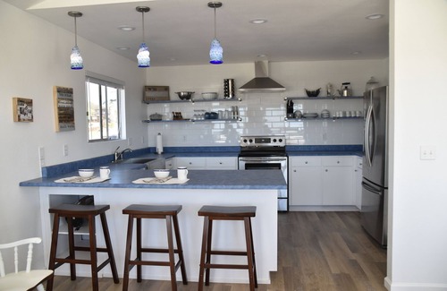 Cayucos House | Coastal VIEWS with easy SURF ACCESS. Home with yard and spa.pets considered!