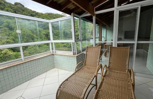 Praia Grande Apartment | Cobertura 3 suítes com Ar condicionado, 300 metros da Praia Grande, Piscina, Wi-fi, Sauna