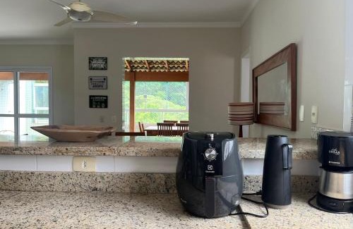 Praia Grande Apartment | Cobertura 3 suítes com Ar condicionado, 300 metros da Praia Grande, Piscina, Wi-fi, Sauna