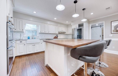 Fortson House | Columbus Oasis: Pool, Hot Tub & Family Fun!