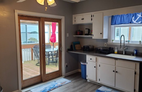 Jonesport House | Come enjoy oceanview in a lobsterfishing community at our Moosabec Reach home.