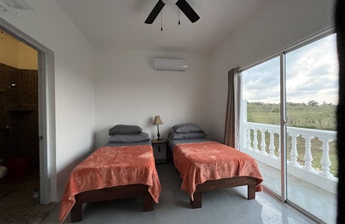 Cabrera Hotel | Comfortable two twin bed room with private bathroom, New, balcony & Ocean view