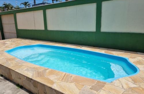 Indaia House | Confortável casa com piscina e churrasqueira a 100m da praia