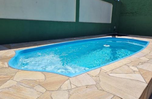 Indaia House | Confortável casa com piscina e churrasqueira a 100m da praia