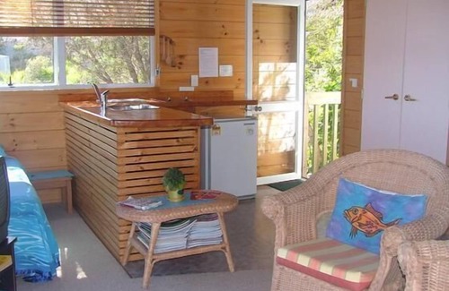 Coopers Beach Cottage | Coopers Beach Retreat-Tui cottage, a modern kiwi beachfront bach. Pet Friendly
