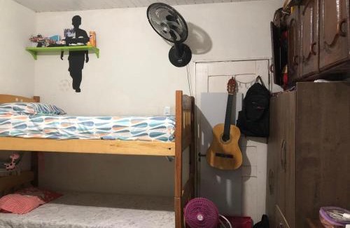 Canudos House | COP 30 suíte com sala e cozinha familiar