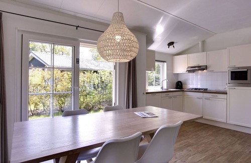 Municipality of Dalfsen House | Cosy apartment in villa for 4 guests with WIFI, pool, TV and terrace