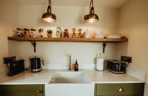 Ballymena Ski Chalet | Cosy countryside Chalet with log burner and hot tub.