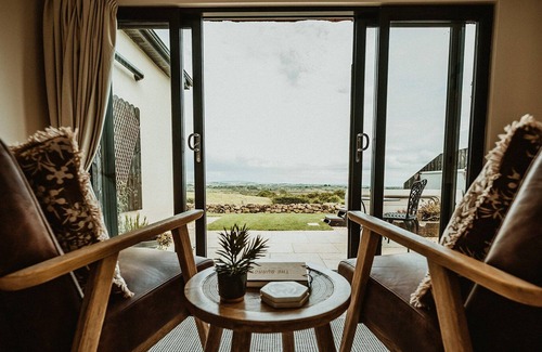 Ballymena Ski Chalet | Cosy countryside Chalet with log burner and hot tub.