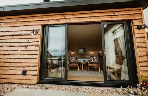 Ballymena Ski Chalet | Cosy countryside Chalet with log burner and hot tub.
