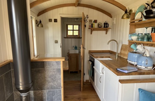 Les Vinaires Cabin | Cosy Shepherd Hut with wood burner and radiator - panoramic sea views!