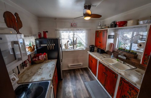 Sundance Cottage | Cottage On The Stream Sundance, Utah Hot tub Sunny kitchen Decks Wood stove Mountain Cabins Utah