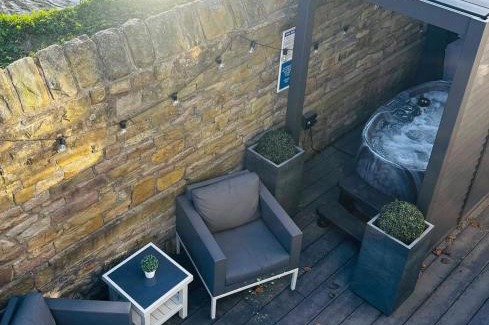 Stockport Apartment | Couples Canalside Retreat with Hot Tub & Pergola