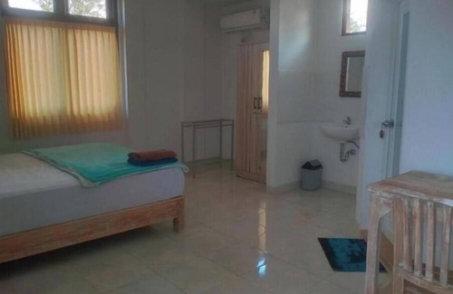 Batubulan Apartment | Cozy 1-bedroom apartment in enjoyable Darmasaba with AC