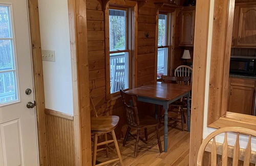 Tuckasegee House | Cozy, 4 front porch rocking chairs, porch swing, picnic shelter, outdoor fire.