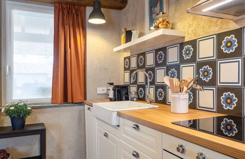 Cressa Apartment | Cozy Apartment with Loft in Restored Farmhouse