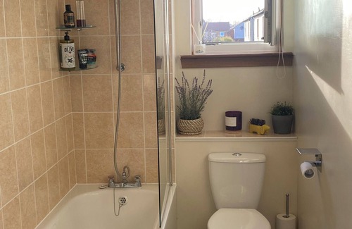 Colinton Apartment | Cozy bedroom in shared accommodation with parking