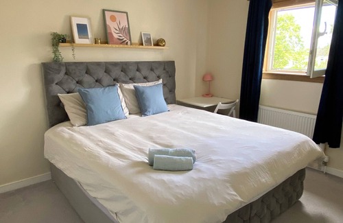 Colinton Apartment | Cozy bedroom in shared accommodation with parking