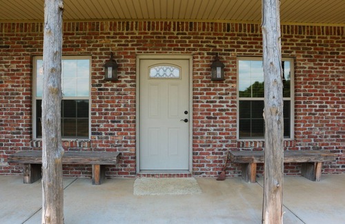 Huntsville Cabin | Cozy cabin nestled in the Ozarks with beautiful views from the front porch.