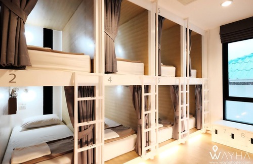 Lak Si Hotel | Cozy Capsule Dorms With a Shared Kitchen and a Social Area