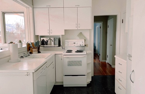 City Centre House | Cozy Character Home in Downtown: Private Garden, Kitchen, W/D, Den