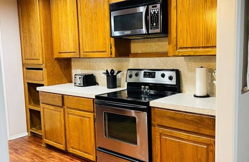 McAlester House | Cozy & Convenient Duplex: Free WIFI, washer/dryer