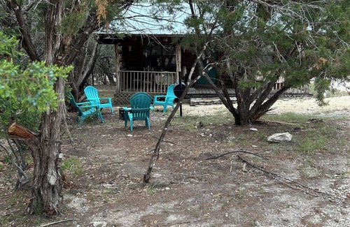 Concan Cabin | Cozy Log Cabin called Buffalo Horizon. Sleeps 4. Close to Frio River
