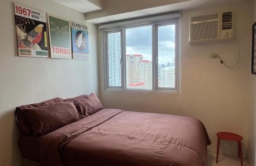 Valencia Apartment | Cozy Nook l Accessible LRT QC l Wifi & Netflix