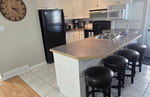 Lethbridge House | Cozy, quiet 4 bedroom home. Perfect for families and work crews!