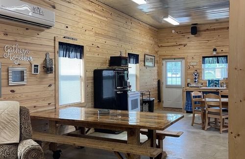 Gretna Cabin | Cozy retreat with lots of room for outdoor activities.