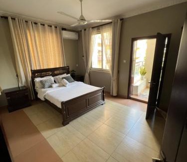 Msasani Apartment | Cozy & Spacious 3BR Near Beach With Pool & Gym