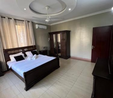 Msasani Apartment | Cozy & Spacious 3BR Near Beach With Pool & Gym