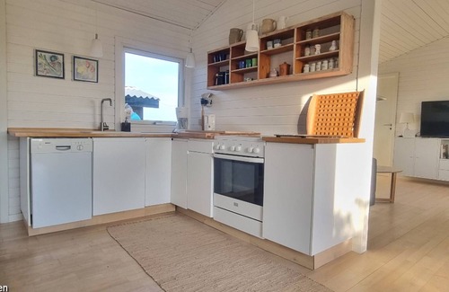 Lokken House | Cozy summer house with a fabulous view and winter garden with WiFi