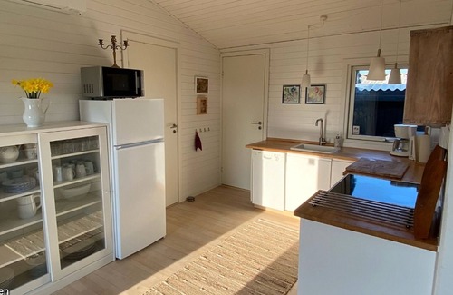 Lokken House | Cozy summer house with a fabulous view and winter garden with WiFi