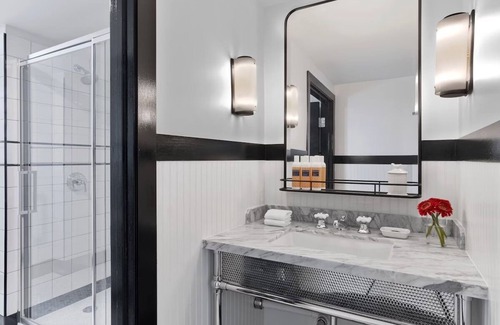 Mount Vernon House | Cozy Up in Baltimore: Artistic Boutique Hotel with Karaoke Rooms & Valet Parking