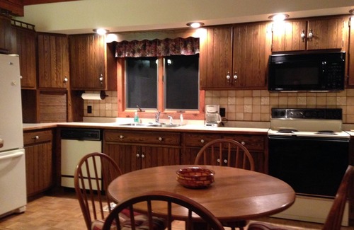 Deerton Cabin | Cozy Welcoming Laughing Whitefish River Cabin Ready For Your Visit