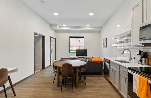 Lockerbie Square Apartment | Cozysuites Mass w Parking Lounge Roof Deck 39