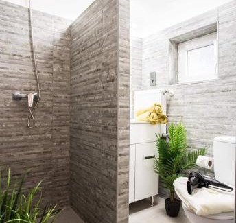 Pecs House | Csigaház Apartman